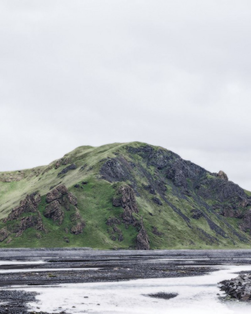 Green rocky hill